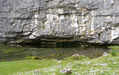 Malham Beck emerging at the base of Malham Cove